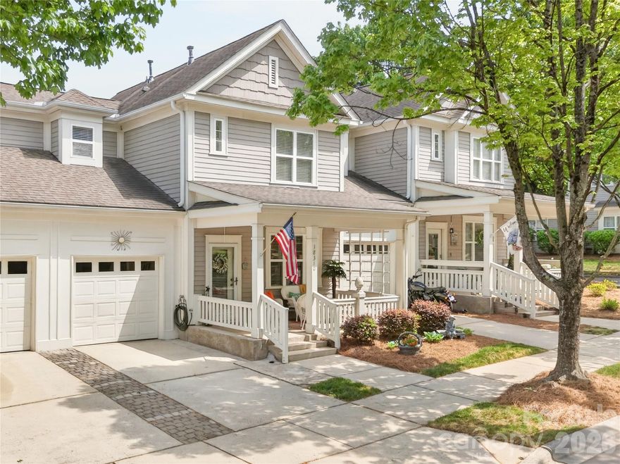 LAKE LIFE may be closer than you think! This charming 2-story home, tucked in the Villages at Harborside, is just down the street from a one-of-a-kind boardwalk along the shores of Lake Norman. Drop a canoe or kayak in the water, rent a boat slip from one of your neighbors (advertised from time to time), or wander down to the adjacent restaurant-in-the-round for dinner with friends and a waterfront view. 
Begin your mornings on the home’s inviting, Southern-style front porch. Inside, sunlight pours into the soaring 2-
story Great Room, and a cozy gas fireplace anchors the space and creates a feeling of home. The Dining Area flows effortlessly into the Kitchen, complete with a cheery breakfast nook made for coffee and conversation and providing direct access to . . . the
BACKYARD RETREAT! Step through sliding glass doors to a fully fenced “secret garden” with lush greenery, blooming plants, and a spacious patio perfect for grilling and simply unwinding. Also on the MAIN LEVEL is the PRIMARY BEDROOM with walk-in closet, en suite bathroom, and handy proximity to the laundry (with washer and dryer included). Upstairs, every inch is thoughtfully used with two sizeable bedrooms each with a double closet, a full bathroom between, and additional storage. The home is complete with a 1-car garage featuring hidden storage, plus driveway and on-street parking. Enjoy the refreshing community pool just a short distance away, adding even more to this relaxed, lakeside lifestyle. If you’ve been waiting for the right mix of charm, convenience, and easy living, this is it!