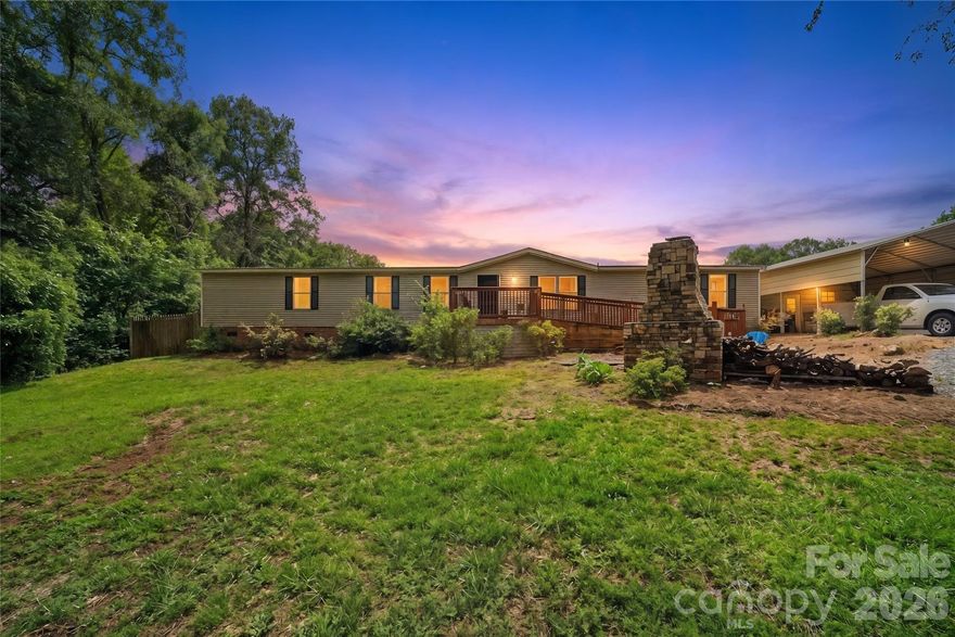Welcome home to this beautifully refreshed, move-in-ready property offering the space, freedom, and modern updates buyers are looking for! With over 2,000 square feet situated on a generous 1.16-acre lot with NO HOA, this home delivers the perfect blend of comfort, flexibility, privacy, and style. From the moment you step inside, you will appreciate the fresh, clean, and inviting feel created by thoughtful updates from top to bottom.

The interior has been beautifully enhanced with brand-new flooring throughout, fresh paint, stylish new cabinetry, updated bathroom vanities, new lighting fixtures, and a bright, modern look that makes every room feel warm and welcoming. The kitchen shines with new stainless steel appliances and updated finishes, offering an attractive and functional space for everyday living, gathering, and entertaining. Enjoy the cozy charm of an indoor wood-burning fireplace, then extend your living space outdoors with an outdoor fireplace that sets the scene for relaxing evenings, weekend get-togethers, and memorable moments under the stars. The private backyard offers incredible potential to create your own custom outdoor retreat, garden, play area, entertaining space, or beautifully landscaped escape. Additional features include a new side deck, detached carport/shed, and plenty of room for storage, hobbies, parking, and outdoor enjoyment. With over an acre of land, no HOA restrictions, and so many major updates already completed, this home is ready for its next owner to move in, settle in, and make it shine even more. A refreshed home with space, privacy, charm, and possibility — this one is a must-see!