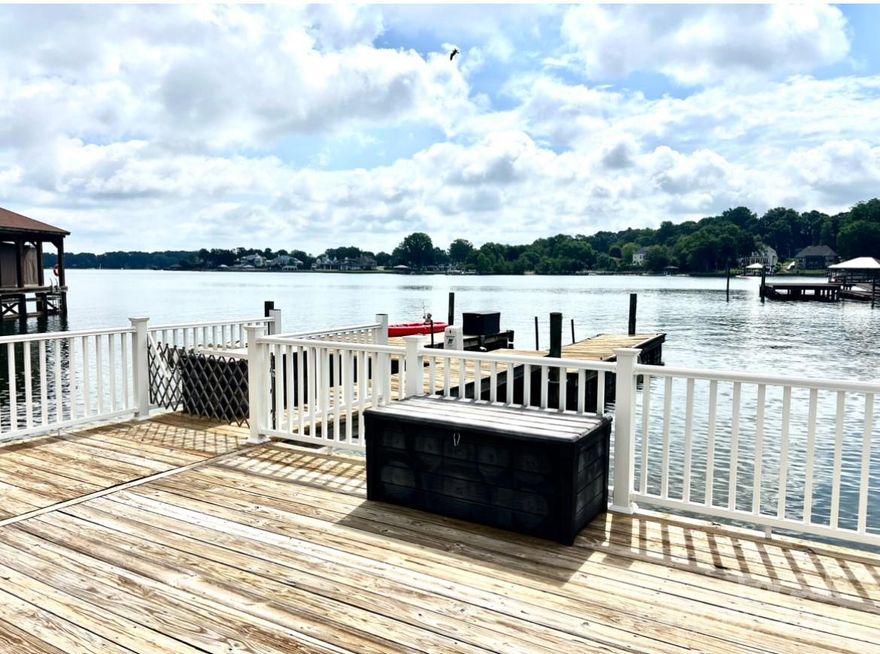 Gorgeous waterfront estate on upper Jetton Road in Cornelius! Walk in to a sun filled double ceiling great room with multiple glass sliders that take you to your waterfront oasis! Just a few steps down from your patio is an expansive flat backyard with tons of room to play. Panoramic views from most rooms in the house! Chef's kitchen with massive island, fireplace, Wolf range, window view sink, warming oven, and PLENTY OF ENTERTAINING SPACE! Expansive dining room inclusive of wet bar. Master on main with immediate access to a relaxing hot tub on deck overlooking Lake Norman. Front and back staircases bring you to 3 additional bedrooms and 2 full bathrooms on upper level. Large bonus room upstairs for fun retreat area. Waterfront backyard includes a built-in grilling station, floating dock and pier as well as built in fire pit. Meticulously maintained custom built home in one of the most desirable areas in all of Lake Norman. Professional photos and measurements coming soon.