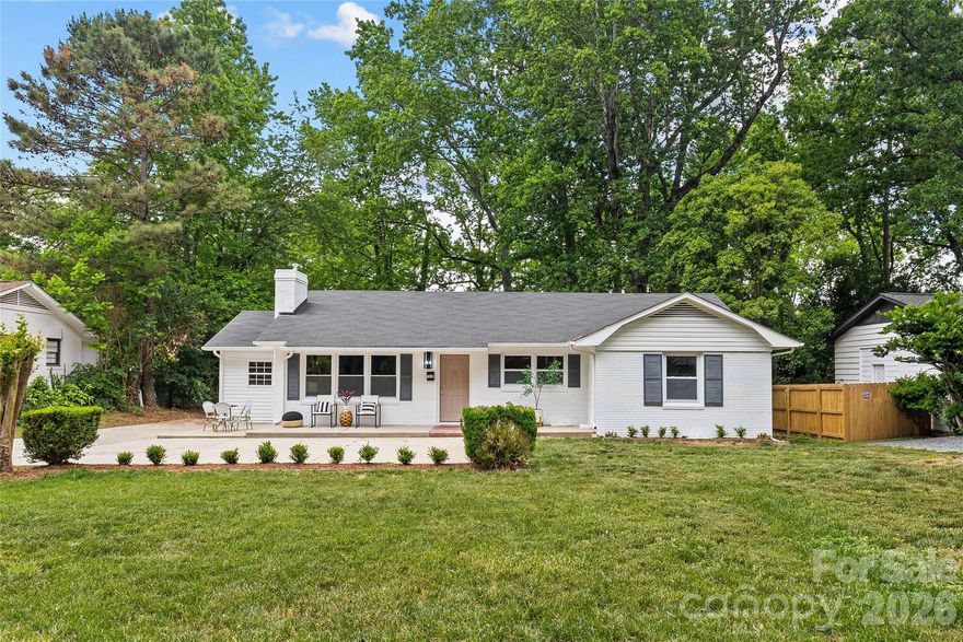 A coveted 4-bedroom, 2-bath home in the popular Windsor Park neighborhood, just minutes from Uptown Charlotte. This updated property features fresh interior and exterior paint, modern finishes, and plenty of parking on a large, flat lot with a spacious yard.  The primary bedroom offers generous space and an ensuite bath with neutral finishes and a walk-in shower. Three additional bedrooms are well-sized and share an updated hall bath.
The kitchen is both functional and stylish, with shaker cabinets, quartz countertops, stainless appliances and LVP flooring. You’ll also find newly refinished hardwoods throughout much of the home. A bright, shiplap-accented sunroom adds extra living space, perfect for a home office or mud/drop zone along with a dedicated laundry room and convenient side entry.  New landscaping completes the home, giving it great curb appeal and a move-in-ready feel.