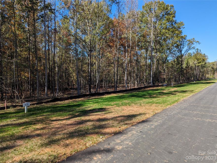 Beautifully wooded lot located in the new neighborhood, Heartland Acres. Over one acre of land. Well and septic tank needed. 4 bedroom septic tank permit included. Come check out this residential lot today to build your future dream home on!