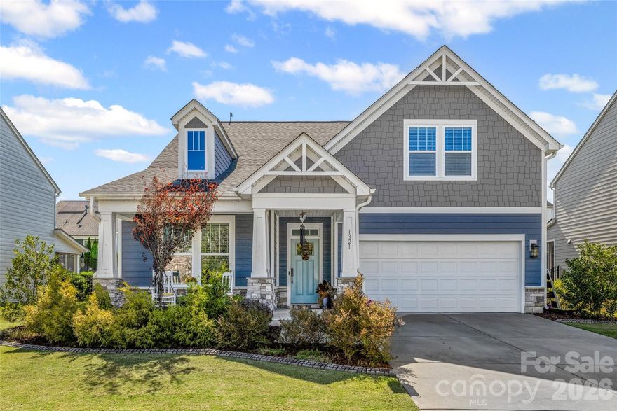 Welcome to 1321 Fishing Creek Road, situated in the highly desirable Paddlers Cove neighborhood. This stunning one-owner residence is designed to impress from the moment you arrive. Enter through the charming rocking chair front porch, enhanced by elegant stonework and columns, and step into the inviting open foyer.
Upon entry, you will be welcomed by soaring ceilings in the expansive great room, which features a cozy gas fireplace and provides a seamless view of the gourmet kitchen, equipped with granite countertops, stainless steel appliances, a vented hood, and a spacious pantry. The owner's retreat is conveniently located on the main floor, showcasing an upgraded deluxe bathroom complete with dual vanities, a separate bathtub, and a tiled shower. An in-law suite is thoughtfully positioned on the opposite side of the main level, offering access to an additional full bathroom. This level also includes a large, elegant dining area that could easily be transformed into an office if desired. Ascending to the upper level, you will discover an ideal retreat for teenagers or in-laws, featuring a generously sized bedroom, a bonus room, and another full bathroom. Custom window treatments adorn the windows throughout the home, adding a touch of sophistication. Furthermore, the residence is equipped with an upgraded HVAC system that exceeds standard builder specifications.Your favorite space will undoubtedly be the four-season room, which overlooks a beautifully landscaped, private, fenced backyard, complete with irrigation for both the front and rear yards. Stone edging enhances the flower beds in the front yard, while large privacy trees surround the backyard, which features a charming stone paver patio. Notably, this home is entirely free of carpeting, with luxury vinyl plank and tile flooring throughout.All of this is complemented by the exceptional amenities offered in Paddlers Cove, including a pool, playgrounds, walking trails, a kayak launch, pickleball courts, and the premier sports park in all of York County.