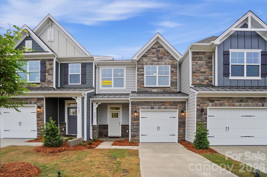 New townhomes in Harrisburg! This Ashland plan has 3 bedrooms, 2.5 baths, and more than 1,800 square feet of living space. The beautiful kitchen has Shaker-style, white cabinets, quartz counters, tile backsplash, and stainless appliances, including a gas range and microwave. The kitchen opens into the dining area and family room, which opens to the covered porch. Stairs with metal balusters lead to the upper floor that has a loft, laundry room, two secondary bedrooms, a hall bath with tub/shower combo, and the spacious primary suite. The primary bath has a tiled shower with a bench seat, dual-sink vanity, and a linen closet. All bathrooms feature white cabinetry and white quartz counters. Additional extras include a foyer with tray ceiling and Enhanced Vinyl Plank flooring throughout the main level. Community amenities feature a dog park, playground, paved walking trail, outdoor pool & cabana.