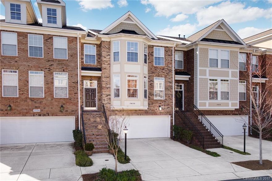 Outstanding 3 stry townhome in South Chlt. across from Arboretum. Gated community with pool and gazebo. Outstanding attention to detail, Plantation Shutters in front areas. Wet bar/sink. Hardwood floors/ steps  throughout main area. Granite in kit. and bar area. Stainless steel appl. Cozy gas fireplace w/private deck off main. Two HUGE bedrooms upstairs with convenient laundry. Guest bdr. w/full bath. Lower level features a private bedroom unique to this plan, with a bonus room and full bath.