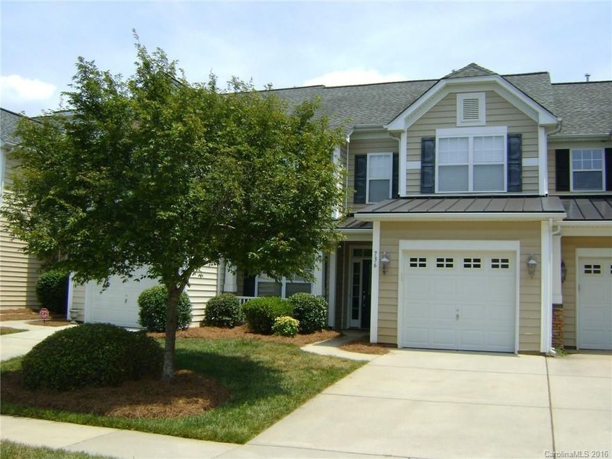 Stunning townhouse with towering vaulted ceiling and all the bells and whistles. Nice home in convenient location with HOA pool.