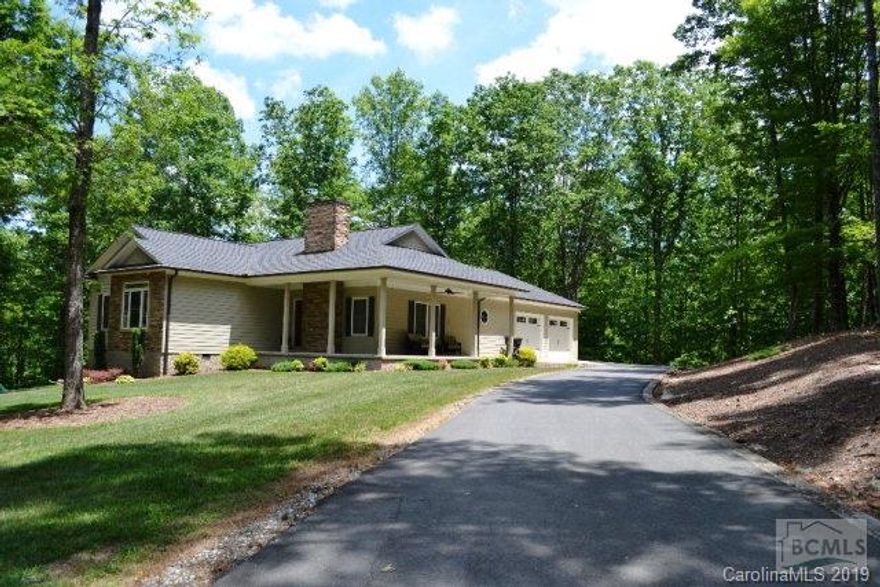 Beautifully modern, like new, 3BR/3BA home on 9 private acres in the Oak Hill area. The quiet you crave with abundant wildlife!  Fine, quality construction and attention to detail includes custom cabinetry, hardwoods, granite. Great Room lives like you do with large kitchen and breakfast bar, vaulted ceilings, dining area, and fireplace. Master bedroom and laundry on main level. Wraparound front porch and deck expand the living space to the endless outdoors. Basement has family/rec room and plenty of unfinished area for workshop, recreation equipment, etc. <p>Playground equipment does NOT stay.