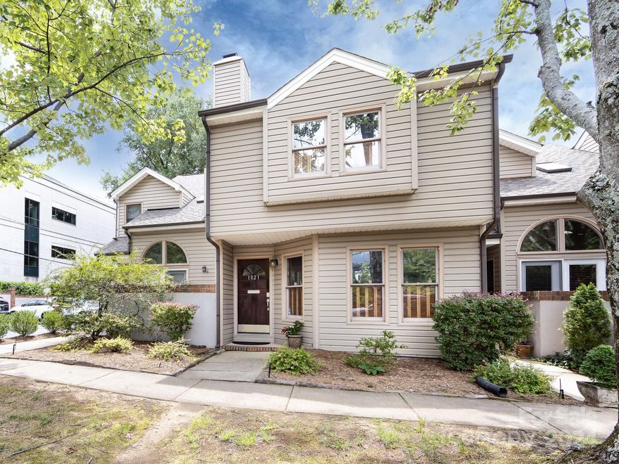 Fresh new look!!!  Entire unit painted with neutral tones.  Spacious and charming two story unit in heart of Historic Dilworth!  8 unit complex is self managed with low HOA dues. Exterior maintenance (other than private courtyard) is covered by HOA.  Great floorpan features kitchen with granite countertops and decorative tile backsplash, stainless stove/dishwasher  and painted white cabinets. Kitchen has bar seating and opens to Dining Room.   Soaring two story Great Room with wood burning fireplace. Laundry on main level with full size stackable washer dryer that conveys.  Huge Primary Bedroom upstairs with double closets and window seating area.  Second BR has loft overlooking Great Room and double closets.  Huge walk in attic area is fully floored.... great storage! Two assigned parking spaces!! Stroll down the sidewalk to popular Dilworth restaurant/shops plus close to Latta Park. Such an ideal location......also convenient to Uptown, Interstates and new Atrium teaching hospital.