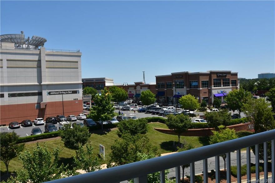 Wow what a view from your covered porch overlooking Ballantyne Village & great night lighting. Top floor end unit. Gated community, walk to shops, dining & more. Granite counter tops, tile backsplash, wood flrs, stainless appliances, fireplace, washer & dryer, refrigerator. M-Bedroom has a large walk-in closet w/organizing system, loaded w/upgrades. Best view, best unit out there