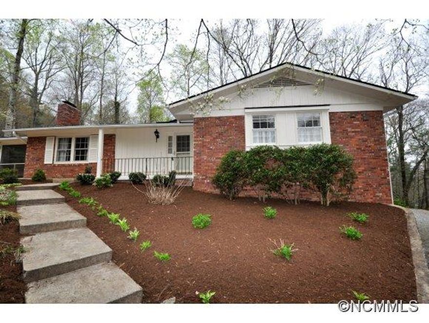 Rich in detail & quality, built for comfort and permanence, this brick traditional home offers generous rooms, updated kitchen, and family room with FP. HW floors. Terrace level game room or BR.  Enormous garage built to accomodate 4 large cars or several small ones -- a place to store the boat, antique car or a collection of toys. Screen porch.