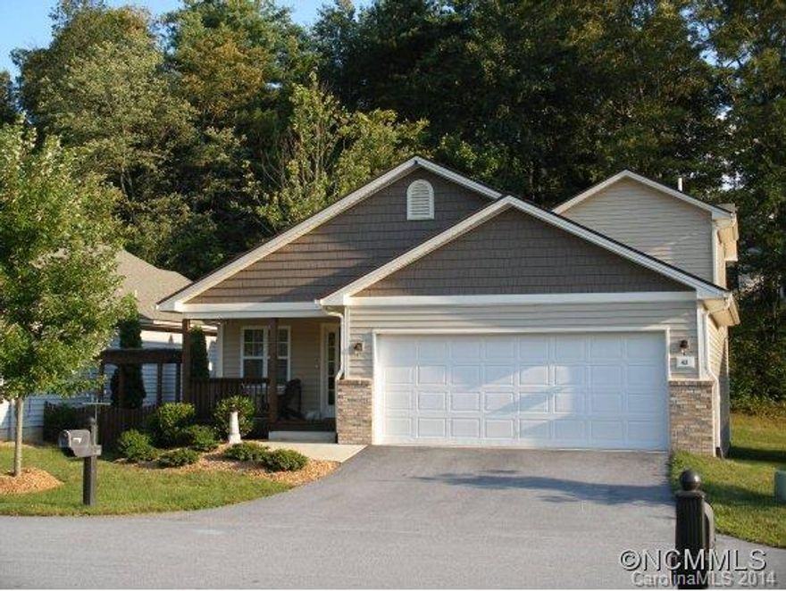 This Gem of a home was the model for the neighborhood.  Upgrades Galore!  If you enjoy sunlight you will enjoy this home with many windows, 6 skylights, glass doors to an oversized private back deck with a sunken hot tub. New Roof in 2012. Nova designed kitchen with pullout shelving. No lawn to cut in this maintenance free neighborhood. Master on main with large walk-in closet.  Home Warranty included & $1,500 Carpet Allowance w/ reasonable offer