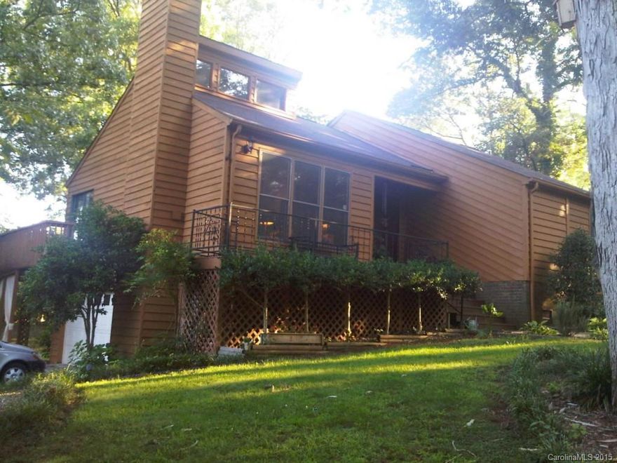 A beautiful restoration with a large private yard with water fountain in front and gardens in back. California slate floors in kitchen, hall, and bath.  Stranded bamboo flooring in family room , new carpeting in lower level.  Fresh paint, HVAC in 2013, Gallery kitchen, large master suite with Juliette balcony, beautiful rocking chair front porch and lower level could be second living quarters (sans kitchen).