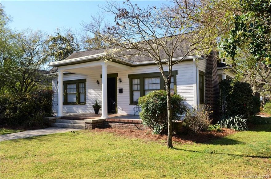 Truly one of a kind bungalow. High ceilings, original wood floors + built-ins. Large rooms, loads of natural light, spectacular lot with beautiful landscaping! Hard to find features for the neighborhood  include a heated basement area, HUGE oversize 2-car garage, 3 porches (including screened), small art studio. This home is surrounded by $400K+ new construction homes ... it is move in ready or you can add on to create your dream home. Walk to all NoDa offers!