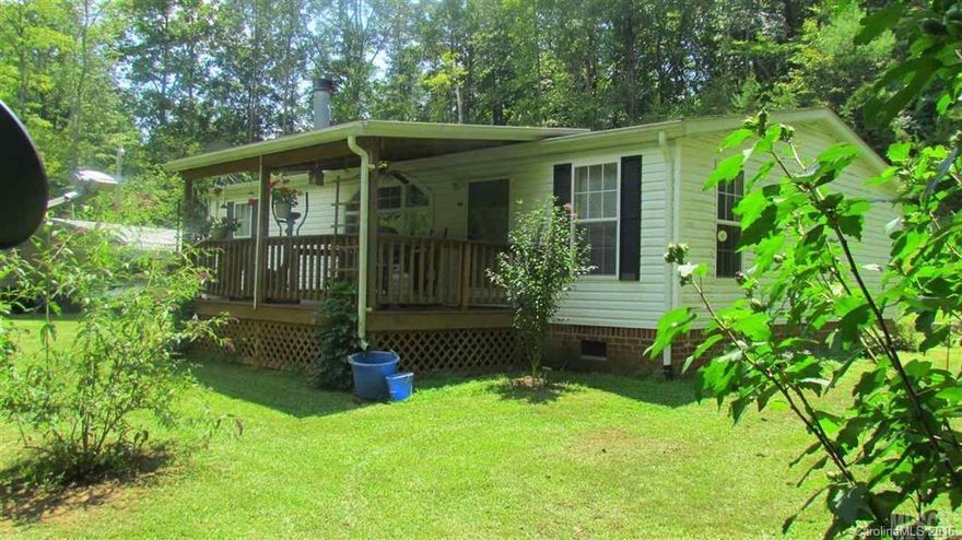 4.9 Acres, CREEK runs through property, quaint & tucked away, Ellendale township, Lg outbuilding wired for electric, covered front porch, tool shed, carport, garden area, and lots of birds for bird watching! Inside features a large and open living room with gas log FP, Kitchen with range, dishwasher, microwave and refrigerator, and nice cabinets. There is an eat in breakfast area with two windows. Master BR has a WIC, master bathroom with large vanity and shower/tub combo!