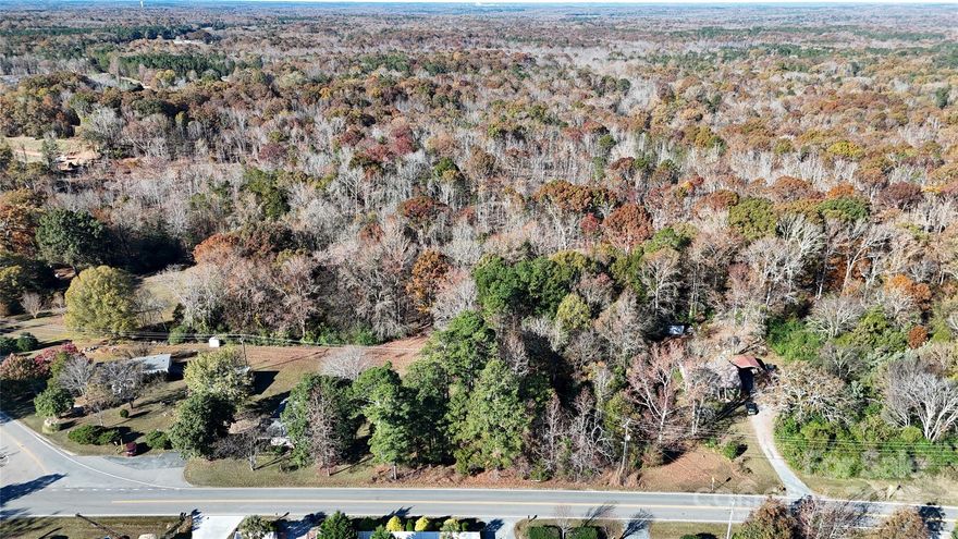 Prime location opportunity! This adjoining 10-acre lot is merely a 10-minute drive to Main Street in Waxhaw, NC. Design your perfect estate on this tranquil escape. Preliminary soil testing is complete, with the soil map provided as an attachment.