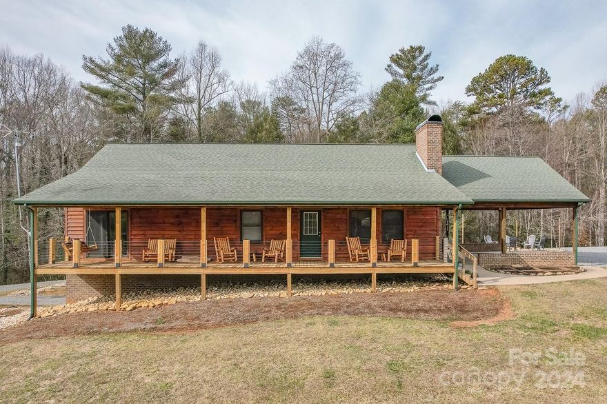Enjoy the serenity of this amazing 26+/- acre property. Enjoy your coffee on the huge,covered front porch w/stunning view of your land! Also has view of Hibriten Mtn. Future possibilities include a wedding, venue, vineyard, nursery, gardening, or farming. Barn & high tensile electric fencing is set up/ready for a horse or a couple cows. Enjoy the convenience of this custom-built home w/everything you need on one floor. Features include open kitchen, LR w/gas log fireplace, dining area great for entertaining, spacious primary BR accesses front porch (w/ his& her sinks w/shower/separate jacuzzi tub), 2 additional bedrooms, full bath & laundry room. The bsmt has den w/wood stove, wet bar, & office space-could be in-law suite w/full bath & laundry hook up. So many options! Just 10 mins from Lenoir-15 mins from Morganton, 30 mins  to Hickory or Blowing Rock, & 1 hr drive to Asheville.  Charlotte Douglas International Airport is an hour and a half away or be in Atlanta, Georgia in 4 hours.
