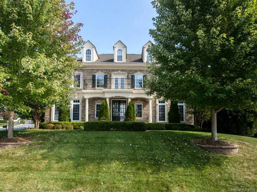 Best price in Bridgemill! This "Signature" home by Wieland is sure to please w 2nd flr balcony on front/rear. This home features hardwoods on main, central vac, surround sound, Culligan water filter, reverse osmosis. Open kitchen offers custom cabinets w rollouts, ss appliances including gas cooktop, double ovens, fridge & like new dishwasher. Master w tray ceiling, his/her closets, dual vanity, shower &  sep tub, private study & balcony. Fenced yard w custom landscape, pond, covered deck.