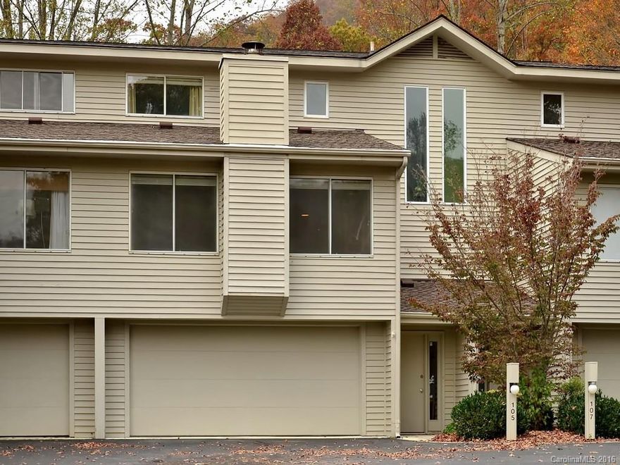 Nestled in Haw Creek Valley, this townhome is very convenient to Asheville. Open floor plan, mountain view and lots of light from two large picture windows in living area, wood floors on main level, quartz countertops in kitchen. Cozy back deck.