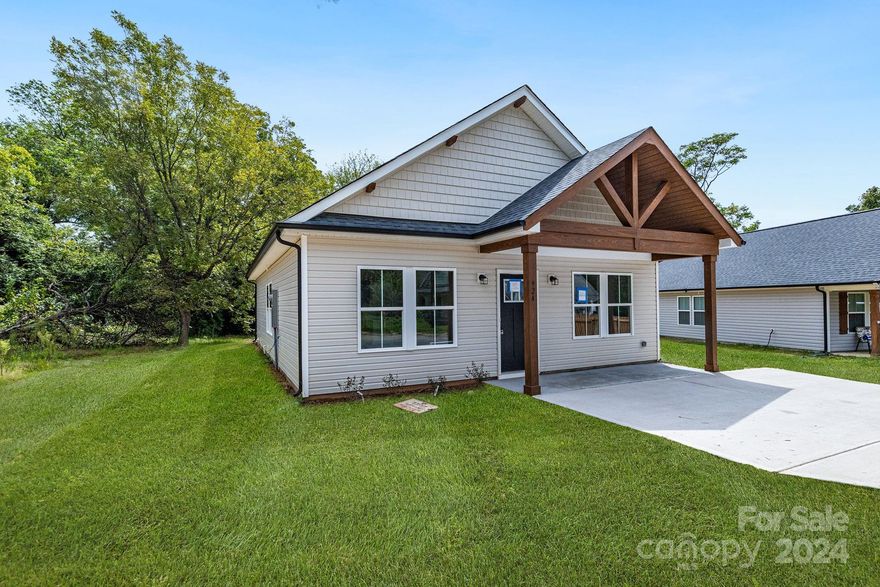 Come discover the flawless craftsmanship showcased in this brand new 3-bedroom, 2-full bath ranch-style home. Unwin on the expansive front porch or host gatherings in the generously sized great room featuring luxurious vinyl plank flooring. Bedroom 2 offers ample storage with its double closets, while the Primary Suite boasts spacious walk-in closets. Additionally, enjoy the convenience of a dedicated laundry room and rear-entry mudroom. The kitchen is a chef's delight with its spacious layout, adorned with white shaker cabinets, granite countertops, stainless steel appliances, and other upscale features. Don't miss out - schedule your showing today!