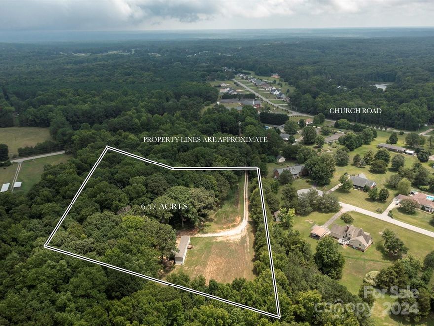 Welcome to this hidden gem of tranquility! 6.57 Acres where half of the parcel is flat and cleared and the other half is wooded, full of hardwoods. Whatever your dreams desire, the opportunity is there for your creativity! Manufactured home is move in ready for a permanent residence, or could be used as a temporary place while you build your forever home!  Use 625 Church Rd, Rock Hill for GPS, 617 Church Rd will take you to the neighborhood behind the property.