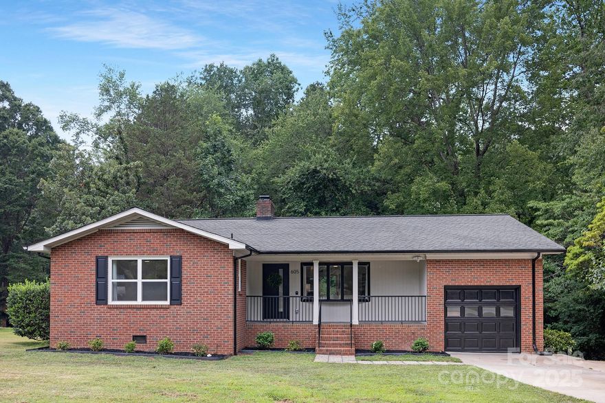Are you tired of all the cookie cutter homes? Check out this beautifully designed home with mid-century modern flare. From the striking fireplace in the living room to the two-tone kitchen with stone countertops and the original hardware, this home makes a statement from the moment you walk in the door. The large living room with its picture window is open to the kitchen and dining room. Patio doors from the dining room lead to a large deck overlooking a private and shaded back yard. A large primary bedroom with tons of natural light is accompanied by a private en-suite that incorporates wood-like tile for a serene feeling. Two secondary bedrooms and another beautiful full bath finish out the main level. In the basement, you will find a second living area and another large bedroom or office complete with terrazzo-like floors. Located within the Mooresville Graded School district and walkable to both the elementary and high schools makes this home hard to beat!