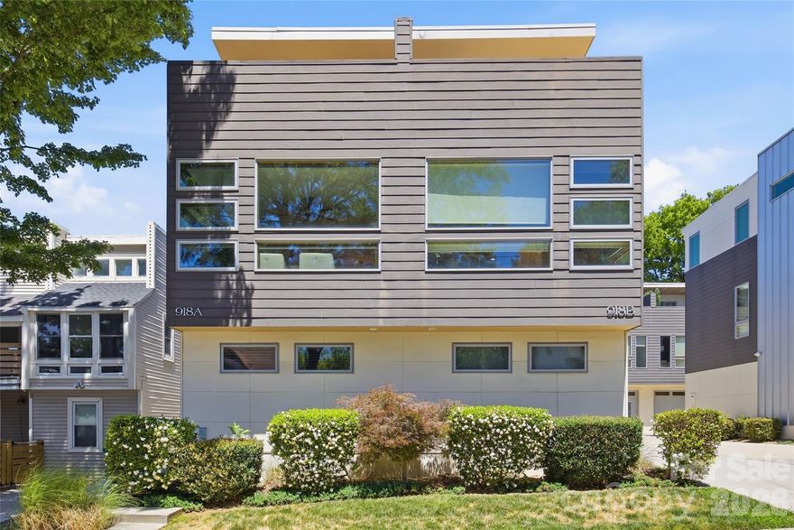 Thoughtfully designed and filled with natural light, this modern condo in the heart of Third Ward lives much more like a contemporary townhome. The home features soaring ceilings, expansive windows, warm hardwood floors, and beautiful skyline views from the private rooftop terrace.

Unlike many similar properties in the community, the rooftop terrace is accessed independently rather than through the primary bedroom, creating a far more functional layout for entertaining while preserving privacy within the owner’s suite. The rooftop retreat becomes a true extension of the living space — an inviting setting for morning coffee, effortless entertaining, and enjoying the Charlotte skyline with friends and family.

The open main living area features an open-riser staircase and a sleek chef’s kitchen with quartz countertops, oversized island, gas cooking, stainless steel appliances, and modern cabinetry. The spacious primary suite offers a spa-like bath with oversized glass shower and generous closet space.

Home includes a professionally installed structured media/network cabinet for integrated audio/video, networking, and smart home infrastructure, as well as a Rinnai tankless water heater.

Ideally located near Bank of America Stadium, Uptown Charlotte, Greenways, parks, dining, breweries, and entertainment, this is a rare opportunity to own a modern residence that combines thoughtful design, skyline views, and an exceptional urban lifestyle.