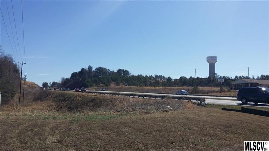Ban Owned 3.06 acre potential retail or Office build site on busy Hwy 321.  Property is graded and level with city water and sewer available.  Entrance has access from Hwy 321 North and South which is rare in this area of Granite Falls.  City of Granite Falls states current HB zoning has many potential uses and they are eager to work with potential buyers.