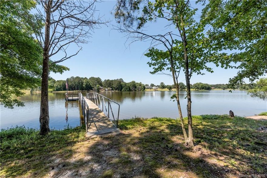 One of Lancaster's best kept secrets! Live on a private 226 acre lake enjoying boating, fishing, and relaxing. Private dock and boat landing. Nice home with large sunroom overlooking lake. Wooded lot provides extra privacy. Only 10 minutes from town.