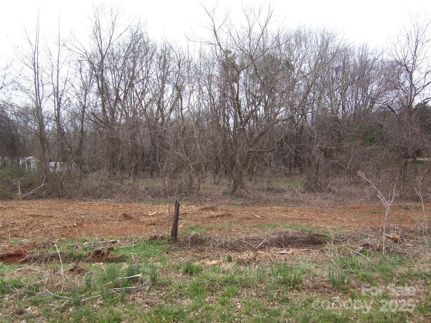 2.66 Acres partially wooded.  Will need well and septic installed.  No restrictions discovered. Manufactured housing allowed.  Rare find!