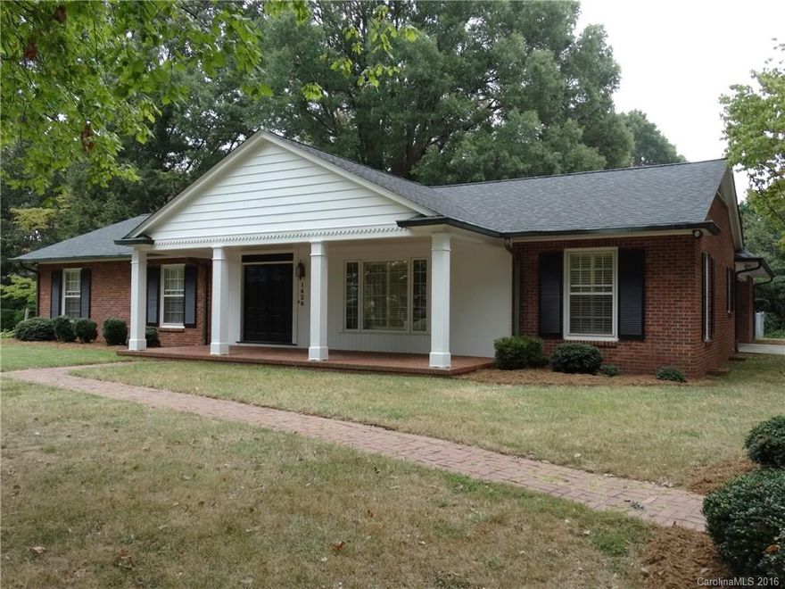 Spacious brick ranch with rocking chair front porch, 3 bedrooms, 2 baths, glassed sunroom has baseboard heat and fans, Gas log fireplace with built in book case beside it. Neutral decor. Water heater 2012, roof 2009. Formal living room and formal dining room, spacious den. Lovely neighborhood.