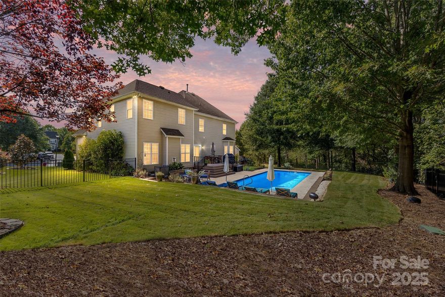 Look NO further! Extraordinarily UPDATED 4BR home on a cul-de-sac with a swimming pool! This home has upgrades throughout including LVP flooring & a renovated Kitchen with white cabinets to the ceiling, quartz c-tops,  center island w/bar seating, subway tile back splash, SS appliances & under cabinet lighting.  Private office on the main level w/glass French doors! Two-story Foyer w/new chandelier. Formal DR & LR feature moldings + tray ceiling. Spacious Great Rm w/gas fireplace & recessed lights. Dual staircases w/black spindles! Large Primary Suite has dual French doors, a tray ceiling, recessed lights and a sitting area + Bath w/dual vanities, garden tub, separate shower & walk-in closet. All BR's have ceiling fans. BIG Bonus Rm w/built-in cabinets. Neutral paint throughout home! Backyard paradise features a salt-water pool with travertine tile surround and a Timbertech deck. There's more...a tankless water heater, whole-house water purifier and built-in speakers. Two car garage with built-in storage above the doors. Super easy access to I-77 and a quick commute to Charlotte. This one has it ALL and could not be more MOVE-IN Ready!
