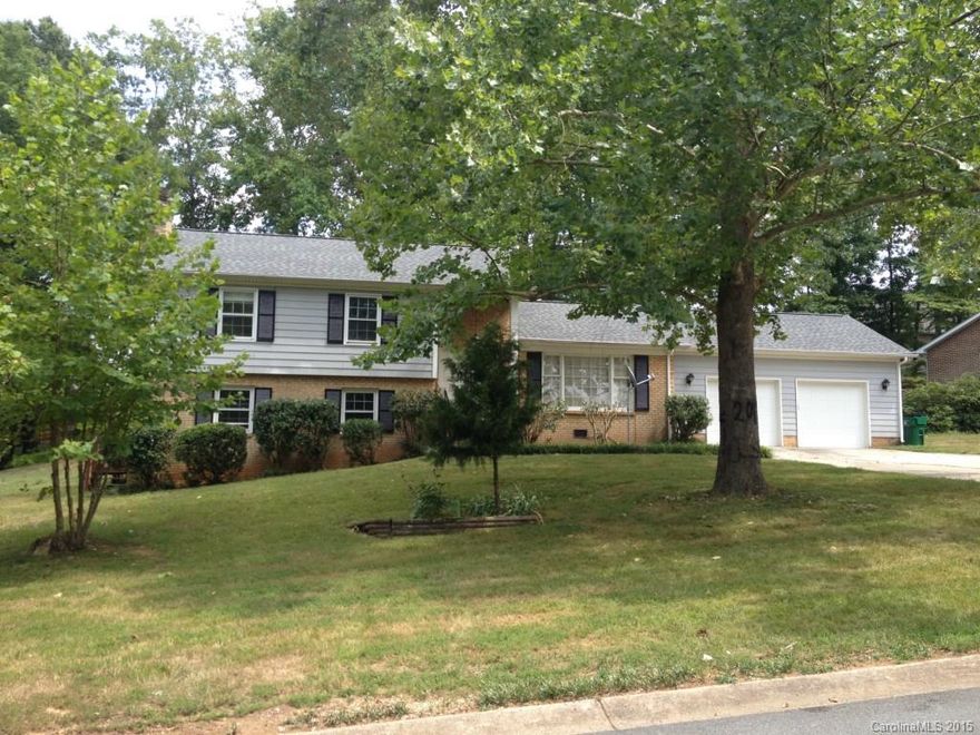 4 bedroom split level home close to everything! Plenty of storage in home with a 2 car garage and a workshop attached. Living room on the main level as well as downstairs. Master bedroom is upstairs with one of 3 full baths in the home. Newly refurbished back deck perfect for end of summer cook outs!