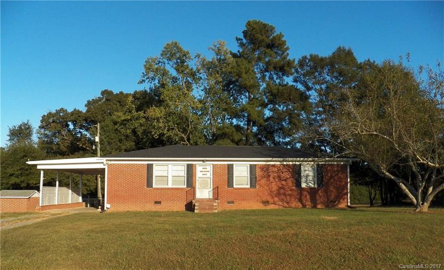 Come see this cute brick ranch in move in condition. Almost an acre with mature trees & partial fencing. Perfect for the first time home buyer or as an investment property. This home has beautiful hardwoods that are in nearly perfect condition. 3BR/1.5BA & great living space. All BRs have ceiling fans & fairly decent closets for a home of this era. Architectural roof was installed in 2016. Large L-shaped kitchen is open to dining/breakfast area. Separate laundry room. A must see! Sold as is.