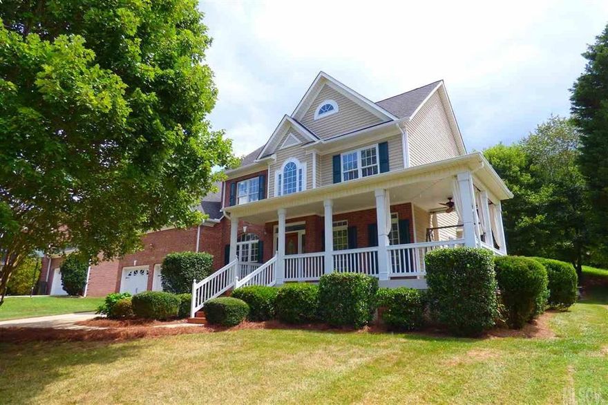 A wrap-around front porch welcomes you to this spacious home in Olde Mill Landing, featuring a two-story foyer opening onto both a formal dining room with octagonal tray ceiling and a home office with French doors for privacy. The back of the house offers a large great room with gas log fireplace and adjoining kitchen, complete with pantry, plenty of cabinet space, and a bayed breakfast area. A small rear hallway leads to a main level bedroom and adjacent full bath. Upstairs, a central landing opens onto four bedrooms, including a master suite with tray ceiling and private bath with his/hers vanities, jetted tub, separate shower, and large walk-in closet. The 5th bedroom doubles as a bonus room and offers walk-in attic storage. Relax in the tree-lined backyard with deck and beautiful perennial plantings. All this, plus a gated waterfront community with boat launch. HOA Dues: $200/year for common area maintenance.