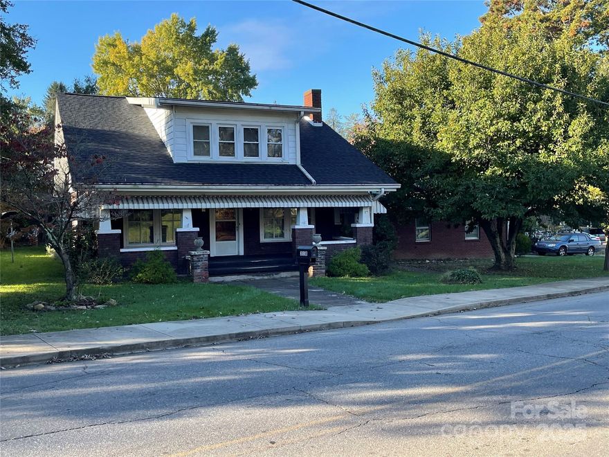 Beautiful 1926 Craftsman with great bones and so many original features. Brand new roof in 2025. Navian whole house hot water heater and natural gas added in 2021. Home features 4 bedrooms, with one on main level, and 1.5 baths. Living room features 1.5" wide oak flooring and has 2 glass-door built-ins flanking the fireplace. Original light fixtures in the living room and dining room remain and are gorgeous! Large galley kitchen features solid wood cabinets but otherwise original to it's 1970s renovation. Large flex room off the kitchen was added at the same time. Upstairs are 3 additional bedrooms and a half bath that could be expanded for a 2nd full bath. Basement offers lots of extra storage space and a 2nd laundry area. Fuel tank is buried and owned. Apco has been fuel provider.