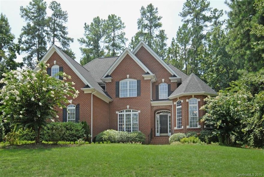 Fabulous full-brick home on quiet street in Lake Wylie's "The Landing" with beautifully landscaped yard. Master suite on main with his/her vanities. Warm Family-Centered Kitchen with Island, SS Appliances, Hardwood & Quartz with open view/pass through to Family Room with gas log fireplace. Split bedroom plan and Large bonus upstairs. Large Patio overlooking fenced private Back Yard. Award-winning Schools! Close to Schools, Shopping & Restaurants. Easy Commute to Charlotte, Gastonia or Rock Hill.