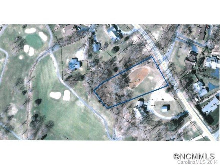 Nice building lot on the golf course in the Etowah Country Club community. Property is sloping to level with easy access off Holly Springs Rd. Close to all major attractions, activities, shopping, etc. Henderson County R-1 Zoning allows Modulars and Doublewide Manufactured homes.  Bank Foreclosure. EM to Buyers attorney.