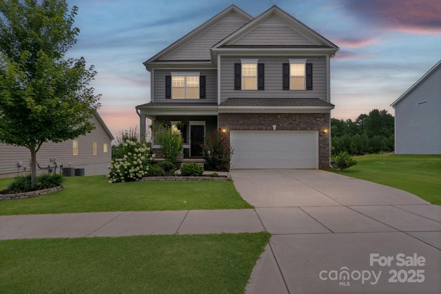 OVER 3300 SQ FT OF LIVING SPACE! Discover this rare Huntersville gem with a hard-to-find unfinished basement—framed, insulated, wired, & plumbed, offering potential for a gym, in-law suite, or playroom. Enjoy peace of mind during storms as well as potential for flexible multi-generational living. The freshly painted interiors with updated finishes and newly stained decks and trim blends the home's style and function. This home was carefully curated with finishes and updates after completion in 2021, making it truly move in ready and maintenence free. Step out to a covered and enclosed sunroom overlooking a secluded backyard oasis with 13 raised garden beds, woodland views, and a scenic retention pond. Pick your own berries every morning while enjoying quiet wildlife moments, all while still being convenient to Lake Norman, Uptown Charlotte, and the airport. If you've been patiently waiting for the one, this is it; more space, more potential, a basement to expand, and a garden to grow.