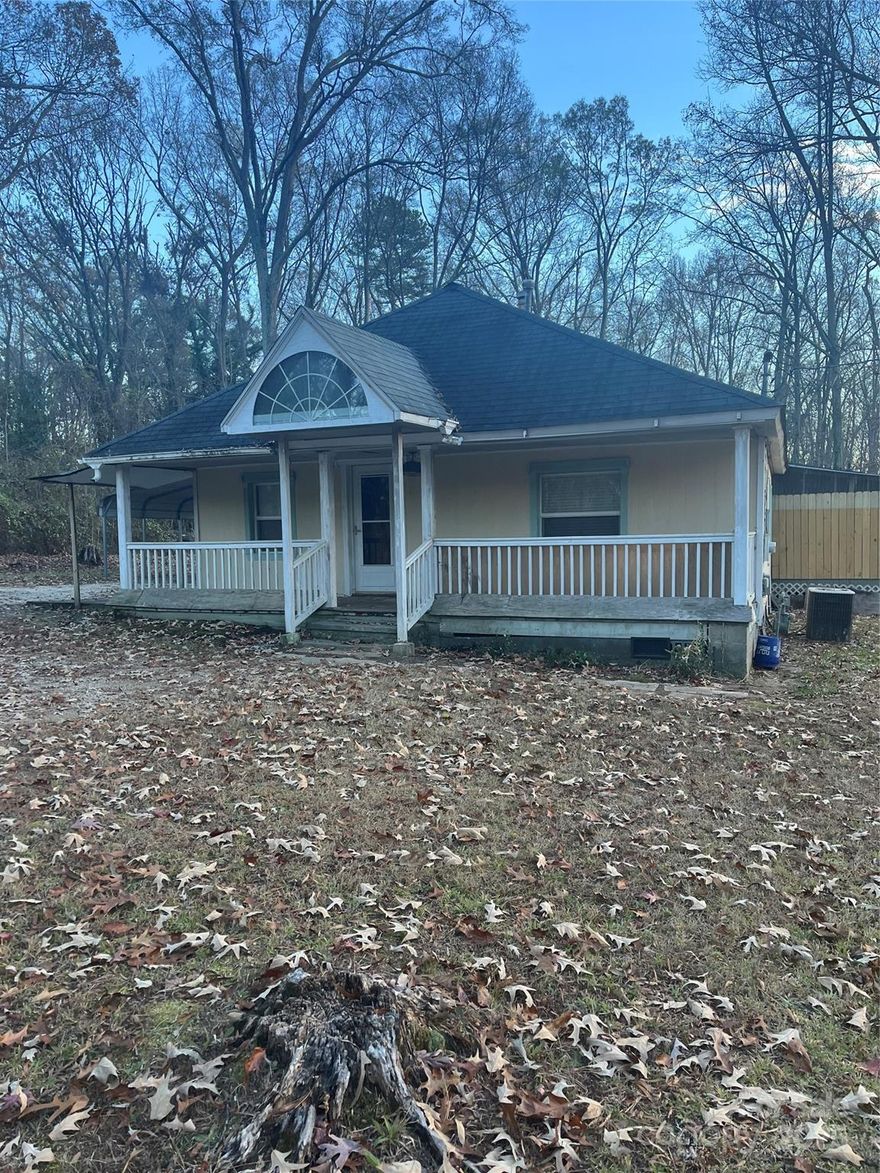 Great Opportunity to own 1 1/2 acres in a quiet area of Charlotte. 
You can also build new homes on this property. The roof was replaced in 2020. The heat and air in 2016.
Don't miss this opportunity.
