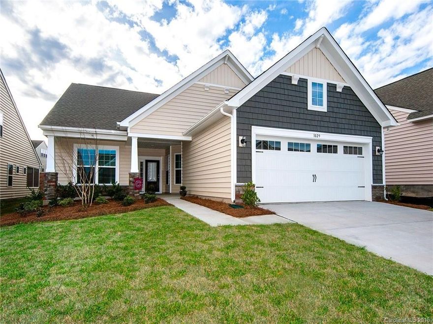 Meticulously maintained almost new home.  Ranch home with gleaming hardwood, granite counters and SS appliances.  Screen porch and stone patio.