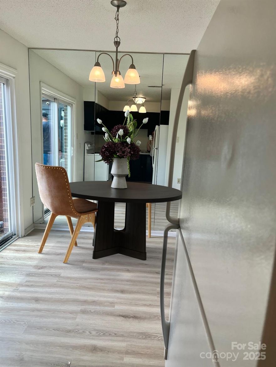 This spacious 2 bedroom one and a half bathroom townhome is conveniently located close to uptown and Plaza Midwood.  The Oaks neighborhood enjoys amenities such as a pool, tennis court, and club house. This is a two story townhome in which 2 bedrooms and one full bath are located upstairs. Kitchen, laundry, great room, and half bath are located downstairs. A private fenced in patio enclosure and outdoor storage unit area are additional features to this unit. The townhome has three designated parking spaces. Don't miss a opportunity to own this newly renovated property with new paint, LVP flooring throughout, new shower tile  in the main bathroom as well as a brand new dishwasher and range hood.