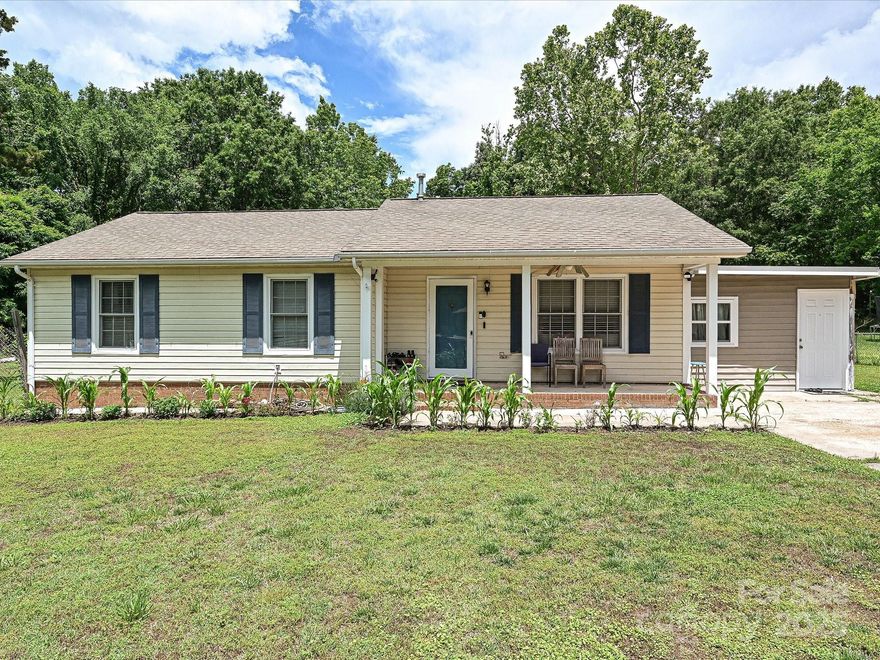 Cozy 3-bedroom 1.5 bath home on over a half-acre lot with NO HOA in Charlotte!  Nestled in a quiet cul-de-sac, this home offers an open floor plan with the living room, dining, and kitchen areas, LVP flooring throughout, and a fully fenced in private back yard.  The oven, dishwasher, and water heater were all replaced within the last three years.  The carport was turned into an additional room that can be used as a "man cave" or playroom.  Conveniently located - close to the airport, I-485, I-77, shopping centers, and much more. Sold as-is.