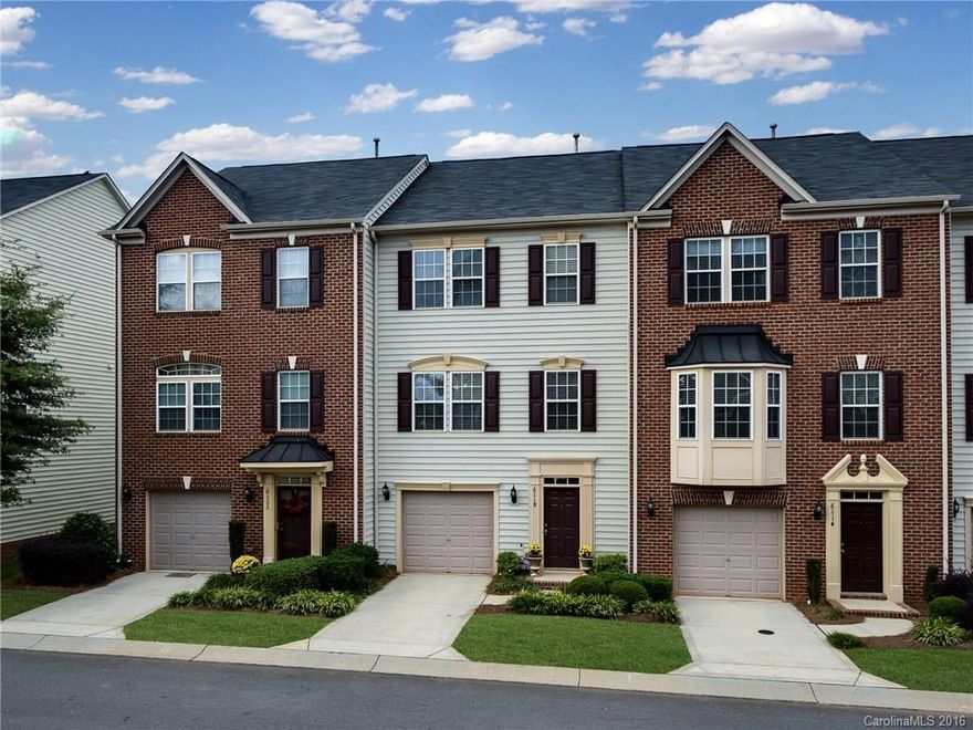 Immaculate three story townhome in gated community. Community amenities include clubhouse, pool and fitness center. Located minutes to South Park, Uptown and light rail. Open floorplan with three bedrooms, two full baths and two half baths! Hardwood floors, formal dining room, stainless steel appliances, and granite countertops. Breakfast area overlooking the great room which features a fireplace. Master suite includes a tray ceiling and huge walk in closet. New carpet and painting throughout!