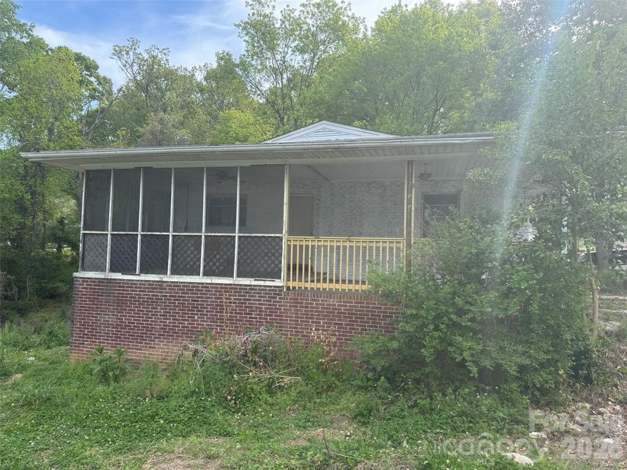 Investors!!! Come & Develop the solid brick home with great bones.