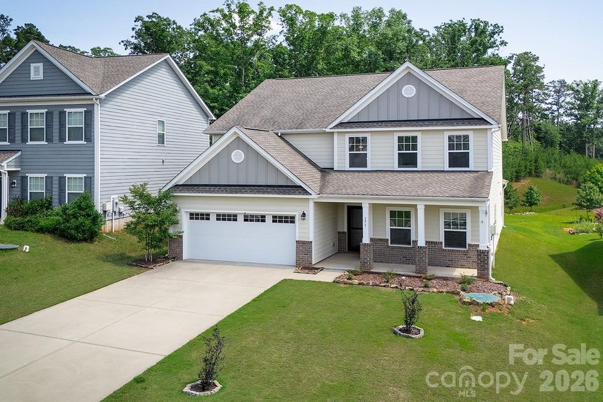 Welcome to Tillery Tradition! This beautiful 2019-built 2-story Wakefield model by TruHomes offers 5 bedrooms, a bonus/game room, and 3.5 baths. The main level features a spacious primary suite, office, mudroom, dining room, and a kitchen with granite countertops, a large island with farm sink, stainless steel appliances, and a butler’s pantry. The open living room includes a wood-burning fireplace. The primary bath offers a soaking tub, updated tile shower with dual heads, and dual vanities. Upstairs boasts 4 bedrooms, an awesome bonus room, and a Jack-and-Jill bath. Sitting on one of the largest lots in the community, this home backs to the golf course! Offering $1,500 buyer concessions! Assumable mortgage is available at 5.99% interest rate!