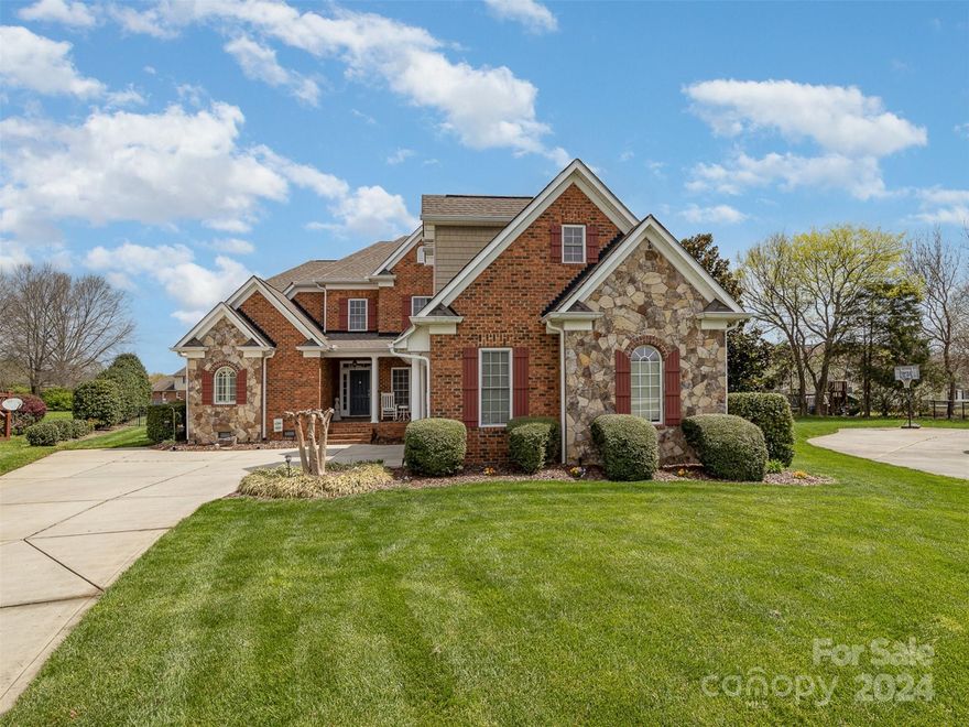 Move in ready, custom, full brick, Harrisburg beauty! Spacious free flowing open floor plan features chefs dream eat in kitchen with adjacent screen porch ideal for your morning cup of coffee or entertaining. Dining area and two story great room provide excellent living space. Primary suite down with dual closets and full bath with separate shower and jetted tub. Upstairs are four bedrooms one of which is en-suite. Fifth bedroom/bonus room also has attached office/studio for versatility. 
In addition to the screened porch, the backyard features free standing fireplace and spacious patio and a well maintained, level and fenced backyard. 
This house is located on a quiet cul de sac lot a short walk to the community pool and play ground.