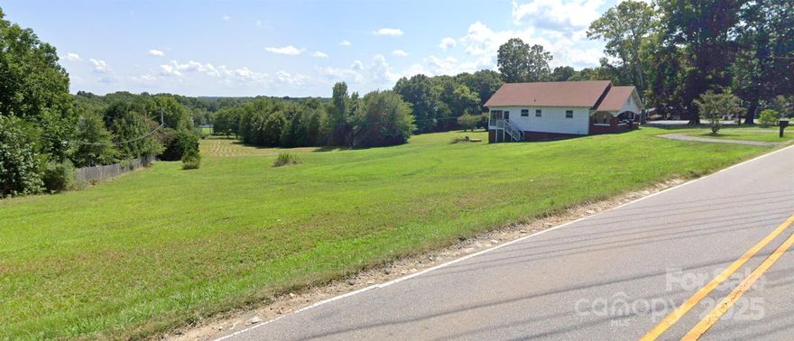 INVESTMENT OPPORTUNITY with 2.3 acres in Cuthbertson school district!! Renovations possible to this late 1930's Craftsman house for those with vision and ready to revive! Sloping lot has a beautiful view of a mostly cleared hillside with wooded perimeter. Some original hardwood floors remain. Ample storage space located under the house. Existing septic and well status are unknown. HVAC system status is unknown/untested. Union County zoning surrounded by Wesley Chapel zoning. Lot can be subdivided into two lots via Minor Subdivision process (with pending Development Ordinance Text Amendment) per Union County Planning Dept. pending perc test for additional septic. Union County Water available at the road but tap would be required. Sellers have never lived in the house. Rear screened porch has floor damage at side entry - use caution. Some By-Right Uses per UC Dev Ord.: Two-Unit House, Family Care Home, Religious Assembly, School, Silvicultural Operations (Supplemental Regs may apply).
