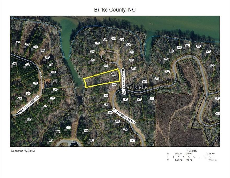 Gorgeous vacant property sitting at 1.14 acres for your dream home to be built with wonderful water views and easy access to the lake. City water and sewer. Gated entrance & Underground utilities. The community has private lake access with dock and boat slips and a large open mountaintop pavilion for barbeques and nice for large family gatherings. Lake Rhodhiss is ideal for fishing, boating, water skiing, wakeboarding, paddleboarding, swimming, kayaking, canoeing, and all water activities! Don't miss this beautiful vacant property this will not last long.