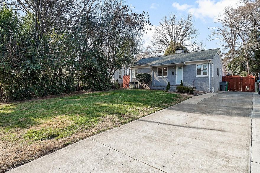 Charming full brick home in sought after location near NoDa, Uptown, and Plaza Midwood. Lots of character with original hardwoods in main areas and wood burning fireplace.  Natural light flows throughout. Living and Dining open to cute Kitchen.  Refrigerator  remains. Oversized Primary is sure to impress with walk in closet & updated ensuite. Two other spacious bedrooms share a modern bathroom. Laundry off kitchen offers great storage.  The backyard is an exceptional outside living space with a large screened porch, patio, place for grilling and entertaining. Custom built shed with slab foundation and covered porch offers tons of uses for storage or workshop. Privacy fence creates a backyard retreat. There is a perfect sunny place for a cooks garden. Convenient to uptown, restaurants, and amenities. Special Financing available for this property; a community lending mortgage with no downpayment option, no PMI and lower than market interest rate. Ask your agent for details.