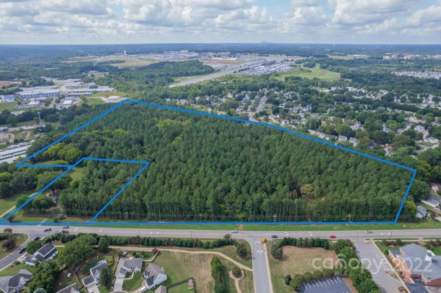 Nice tract of land with great frontage ready for development. Less than 1/2 mile from Highway 29 and 4.25 miles from Concord Mills and I-85.  Currently zoned RM-2 and I-1 with Concord's future plan calling for a MUAC (Mixed Use Activity Center - see attachments for details.)