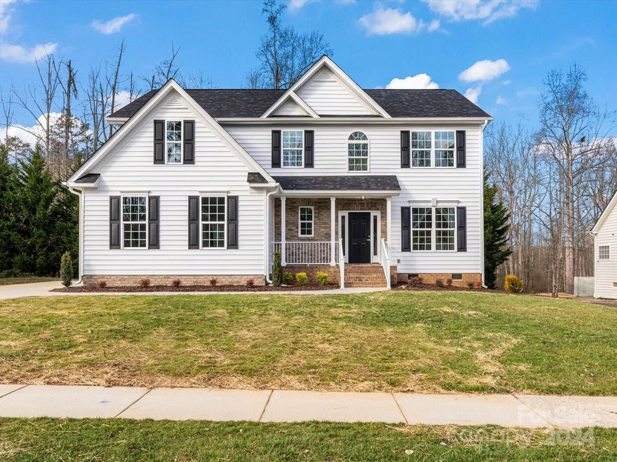 Welcome to your dream home in sought-after Cherry Grove! Following meticulous reconstruction post-fire, this residence is virtually new. Inside you're greeted by a fresh, modern ambiance. New siding enhances the home’s curb appeal. The new roof, HVAC, water heater, plumbing, and electrical will provide peace of mind for years. The impeccable craftsmanship is evident in every corner. The living areas have new drywall and flooring, creating an inviting space for gatherings. The kitchen, has been updated with quartz countertops, soft-close cabinets, and new appliances, including a double oven. The new primary bathroom features a beautiful glass shower and upgraded finishes. Outside, the property offers ample room for outdoor entertainment and relaxation, further enhancing the lifestyle this home offers. Community amenities, include lighted tennis/pickleball courts and an outdoor pool; perfect for socializing with neighbors and staying fit. Located in award winning Mooresville schools.